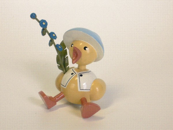 Küken mit Vergißmeinicht